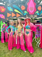 Three people wearing pink layered fringe chaps with robe