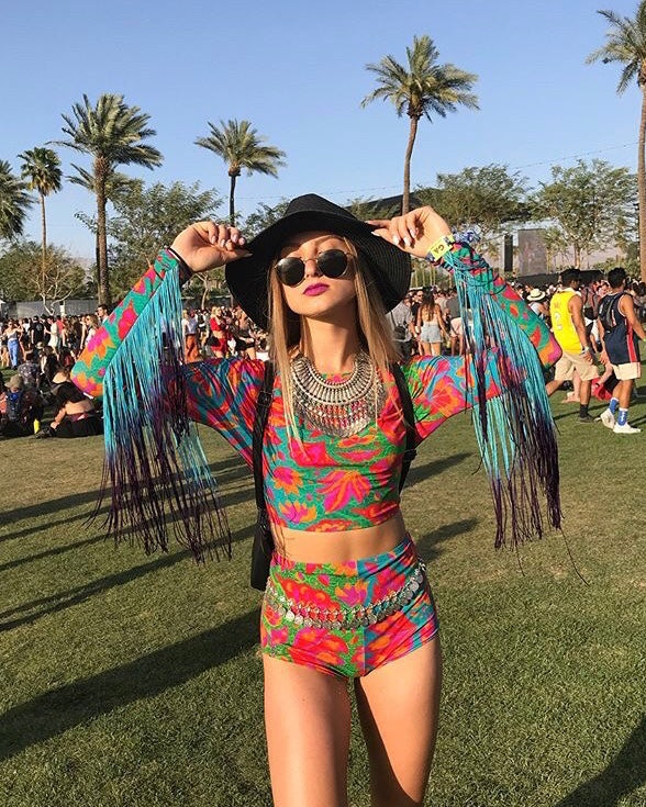 Model wearing lycra hot pants and crop top two piece in matching colourful vendala print