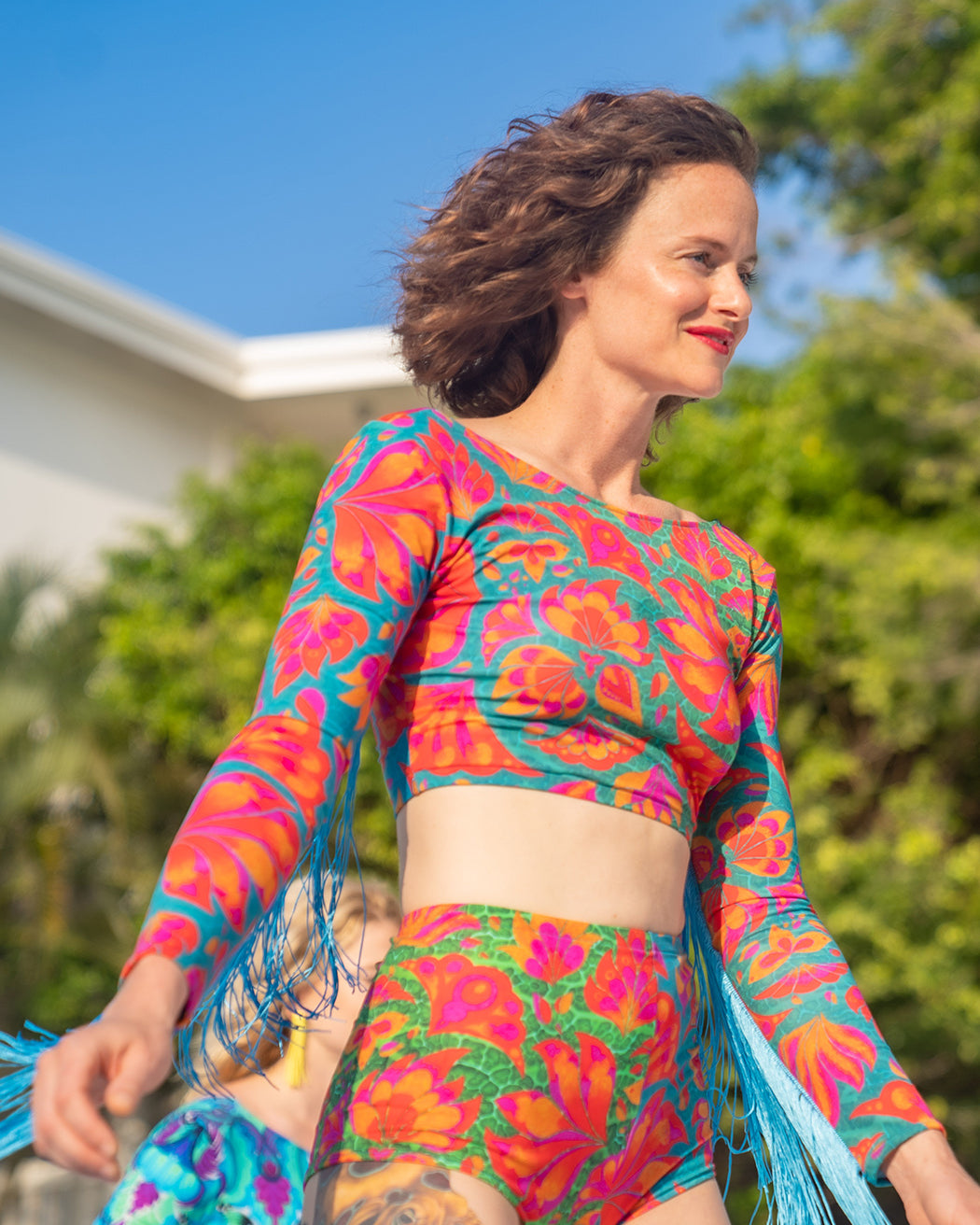 Matching lycra hot pants and crop top two piece with colourful vendala design