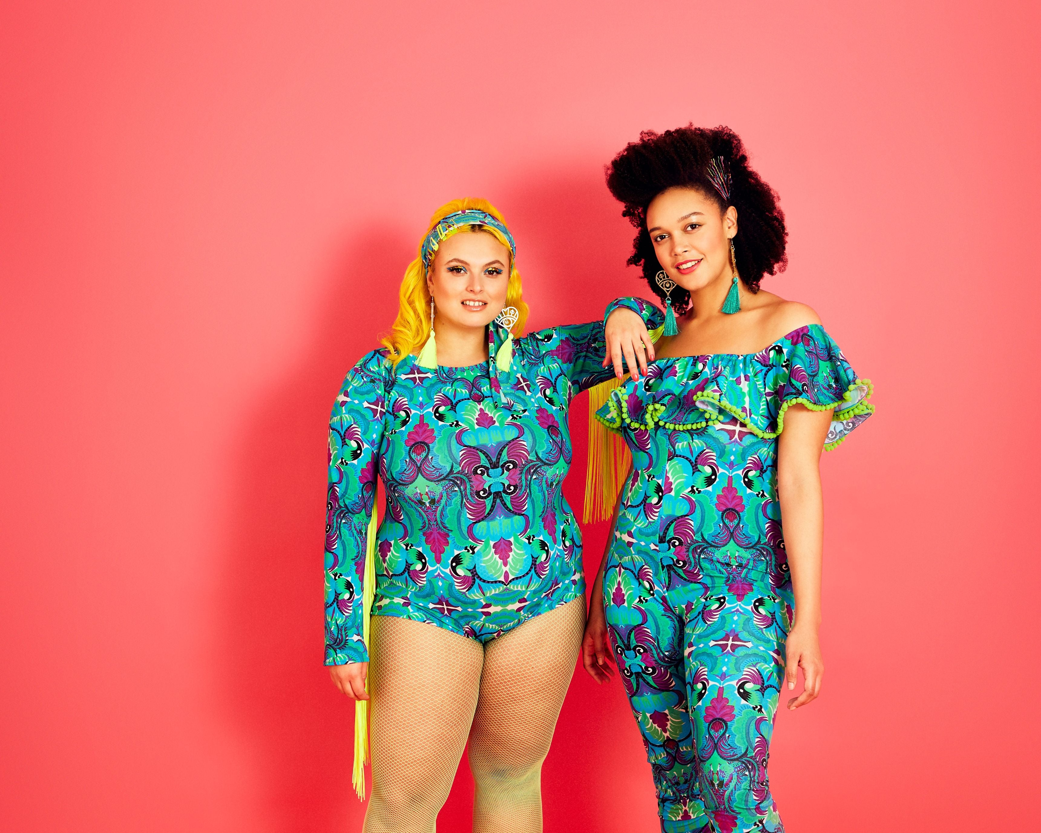 Curvey models wearing tribal tales lycra bodysuit and catsuit