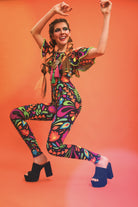 Femina Magicae off the shoulder cat suit with pom poms in black lycra with rainbow colour print