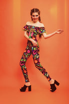 Off the shoulder cat suit in black lycra with rainbow colours in the print