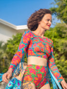 Matching lycra hot pants and crop top two piece with colourful vendala design